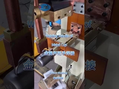 Welding the handle of a metal cup with the stationary spot and projection welding machine