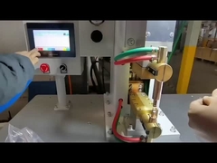 Welding the electronic component with the table spot welding machine
