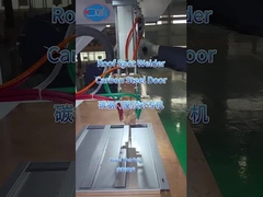 Welding the carbon steel door with the roof table spot welding machine